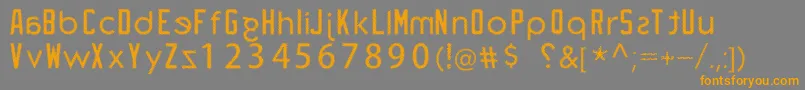 フォントpiegusq – オレンジの文字は灰色の背景にあります。