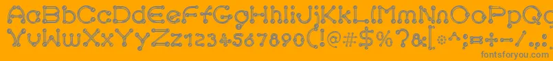 pierced chrom-Schriftart – Graue Schriften auf orangefarbenem Hintergrund