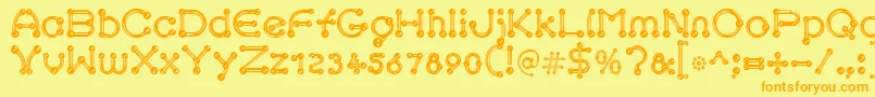 pierced chrom Font – Orange Fonts on Yellow Background