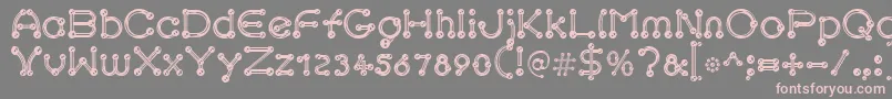 フォントpierced chrom – 灰色の背景にピンクのフォント
