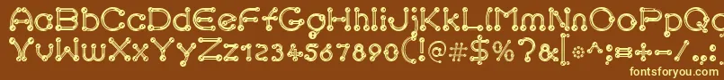 pierced chrom Font – Yellow Fonts on Brown Background