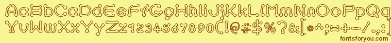pierced outline Font – Brown Fonts on Yellow Background