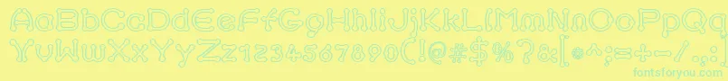 フォントpierced outline – 黄色い背景に緑の文字