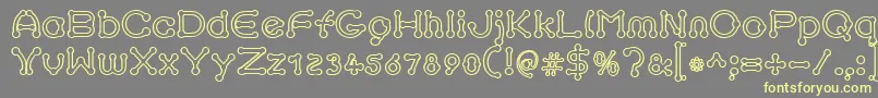 pierced outline Font – Yellow Fonts on Gray Background