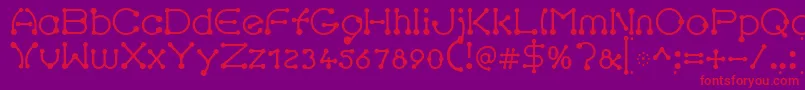 pierced Regular-Schriftart – Rote Schriften auf violettem Hintergrund