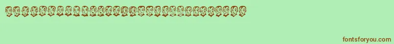 Czcionka PierretheVampire – brązowe czcionki na zielonym tle