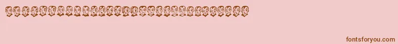 Шрифт PierretheVampire – коричневые шрифты на розовом фоне