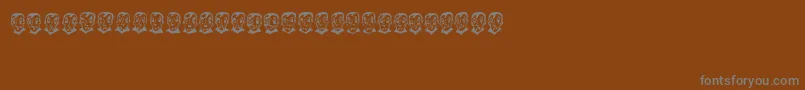 Шрифт PierretheVampire – серые шрифты на коричневом фоне