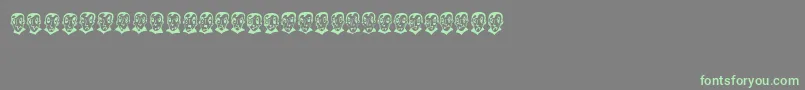 フォントPierretheVampire – 灰色の背景に緑のフォント