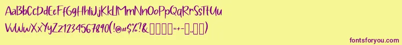 Pig Year Display Font – Purple Fonts on Yellow Background