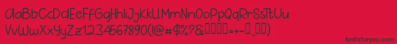 フォントPig Year Sans – 赤い背景に黒い文字