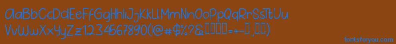 フォントPig Year Sans – 茶色の背景に青い文字