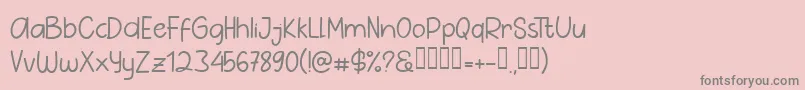 フォントPig Year Sans – ピンクの背景に灰色の文字