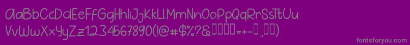 フォントPig Year Sans – 紫の背景に灰色の文字