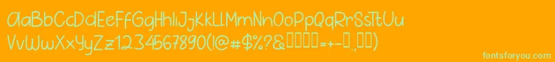 フォントPig Year Sans – オレンジの背景に緑のフォント