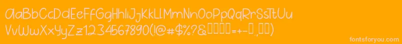 フォントPig Year Sans – オレンジの背景にピンクのフォント