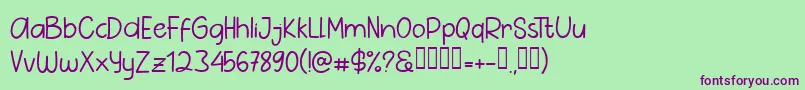 フォントPig Year Sans – 緑の背景に紫のフォント
