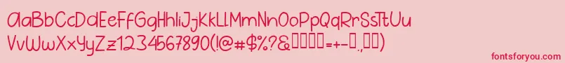フォントPig Year Sans – ピンクの背景に赤い文字