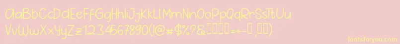 Fonte Pig Year Sans – fontes amarelas em um fundo rosa