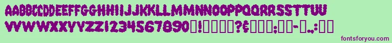 Шрифт PinkCandyPopcornFont – фиолетовые шрифты на зелёном фоне