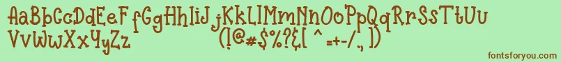 Pinnocio Font – Brown Fonts on Green Background