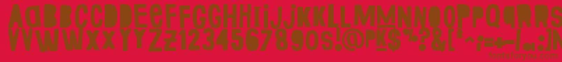 FakeSmiths-fontti – ruskeat fontit punaisella taustalla