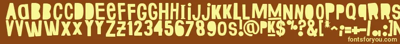 FakeSmiths Font – Yellow Fonts on Brown Background