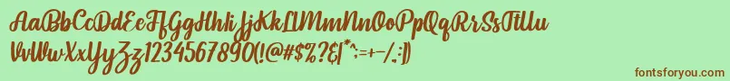 Fonte Pintgram Italic – fontes marrons em um fundo verde