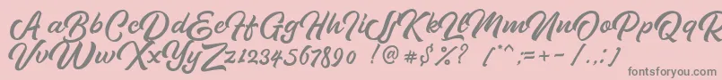 Pipetton DEMO-fontti – harmaat kirjasimet vaaleanpunaisella taustalla