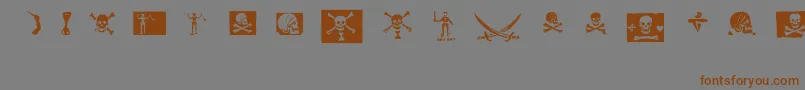 フォントpirates pw – 茶色の文字が灰色の背景にあります。