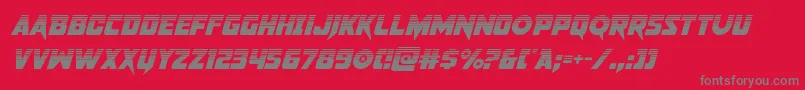 フォントpistoleerhalfital – 赤い背景に灰色の文字