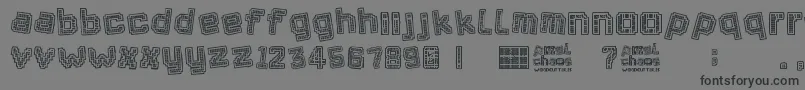 Pixel Chaos-Schriftart – Schwarze Schriften auf grauem Hintergrund