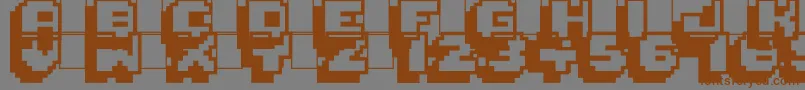 Шрифт Pixelmania – коричневые шрифты на сером фоне