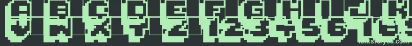 Pixelmania Font – Green Fonts on Black Background