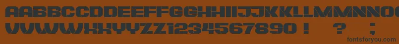 PlagiatBook Font – Black Fonts on Brown Background