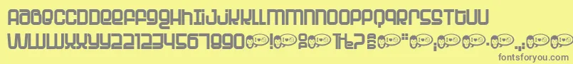 PLANET  -Schriftart – Graue Schriften auf gelbem Hintergrund