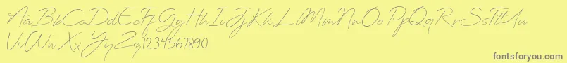 Planets Signature Font – Gray Fonts on Yellow Background