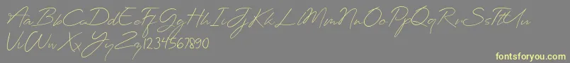 Planets Signature Font – Yellow Fonts on Gray Background