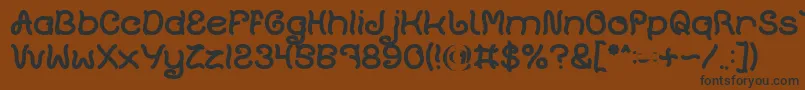 Plant On Lawn Bold-Schriftart – Schwarze Schriften auf braunem Hintergrund