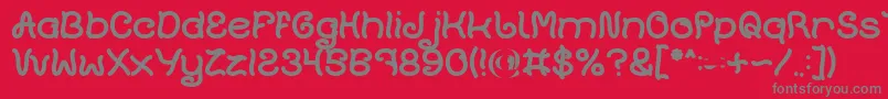 フォントPlant On Lawn Bold – 赤い背景に灰色の文字