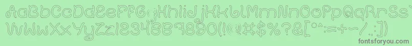 Plant On Lawn Hollow Font – Gray Fonts on Green Background