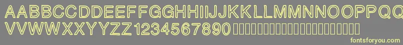 PLAQUE Font – Yellow Fonts on Gray Background