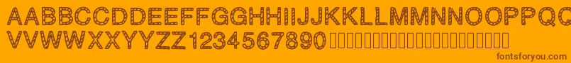 PLAQUEZIP-fontti – ruskeat fontit oranssilla taustalla
