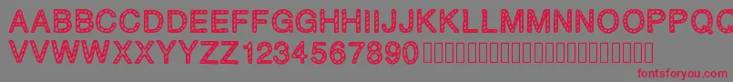 PLAQUEZIP Font – Red Fonts on Gray Background