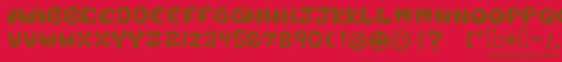 PLAST   -Schriftart – Braune Schriften auf rotem Hintergrund