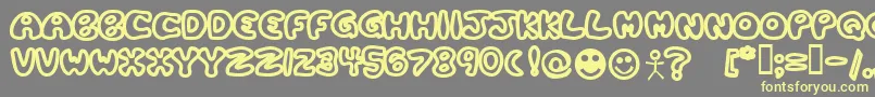 PLASTB  -Schriftart – Gelbe Schriften auf grauem Hintergrund