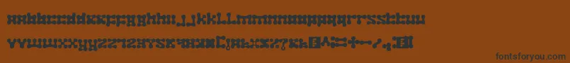 フォントplastelina – 黒い文字が茶色の背景にあります