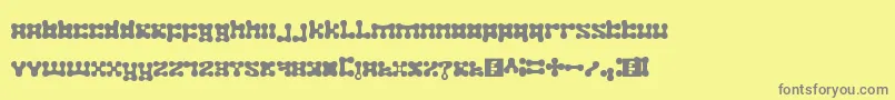 plastelina-fontti – harmaat kirjasimet keltaisella taustalla
