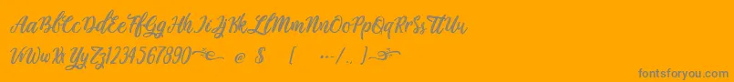 Шрифт Plastic Beauty – серые шрифты на оранжевом фоне