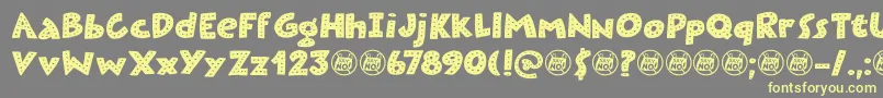 Шрифт Plastic Fantastic Dots DEMO – жёлтые шрифты на сером фоне
